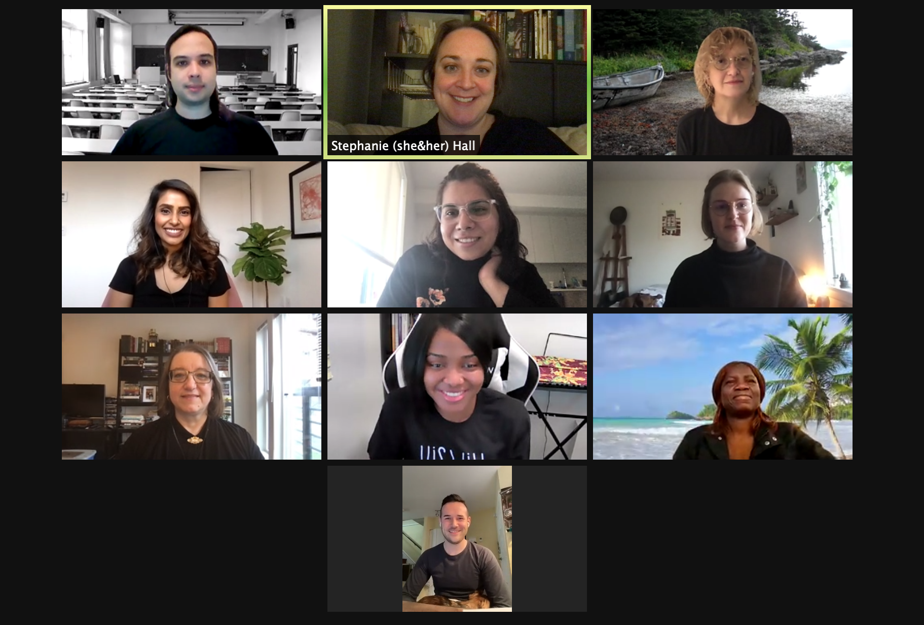 Screenshot of a Zoom meeting with 10 SARAVYC staff members all smiling and wearing black shirts.